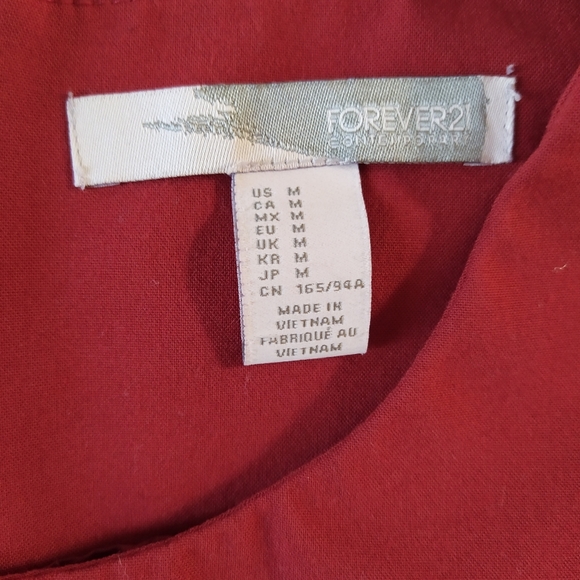 Red Sleeveless Peplum Dress - Picture 8 of 8